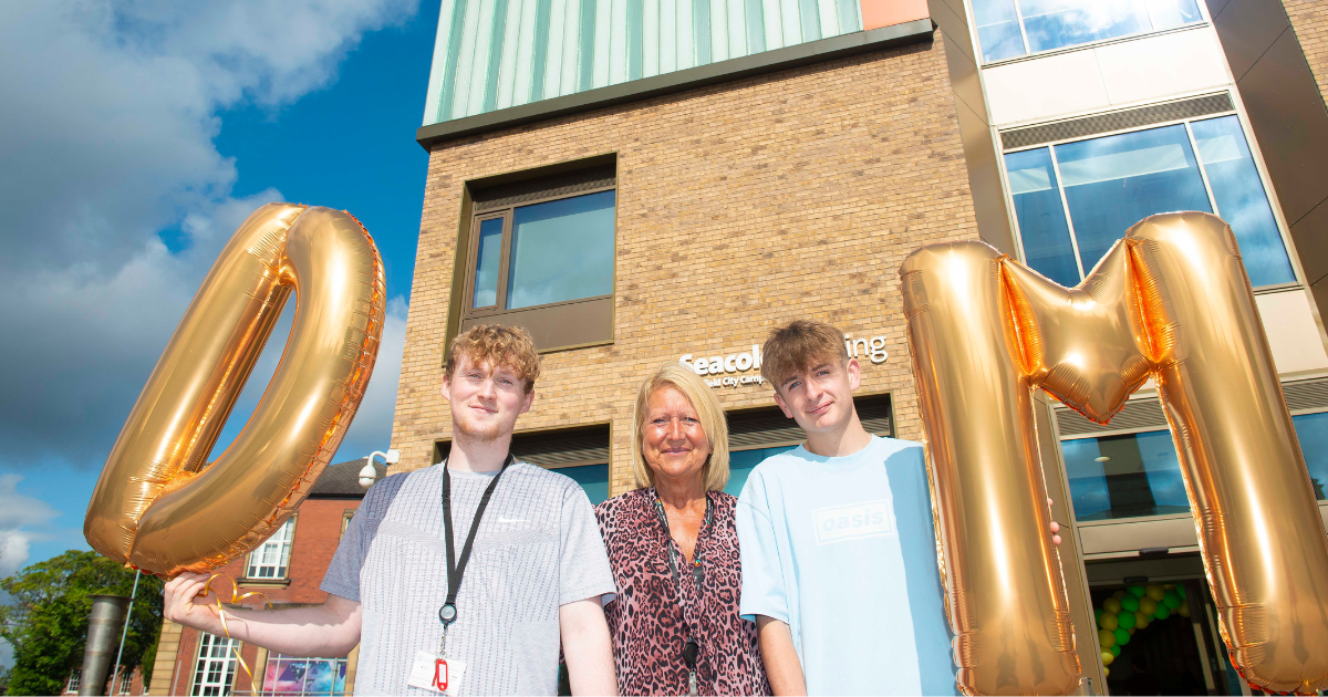 Students with Principal and balloons